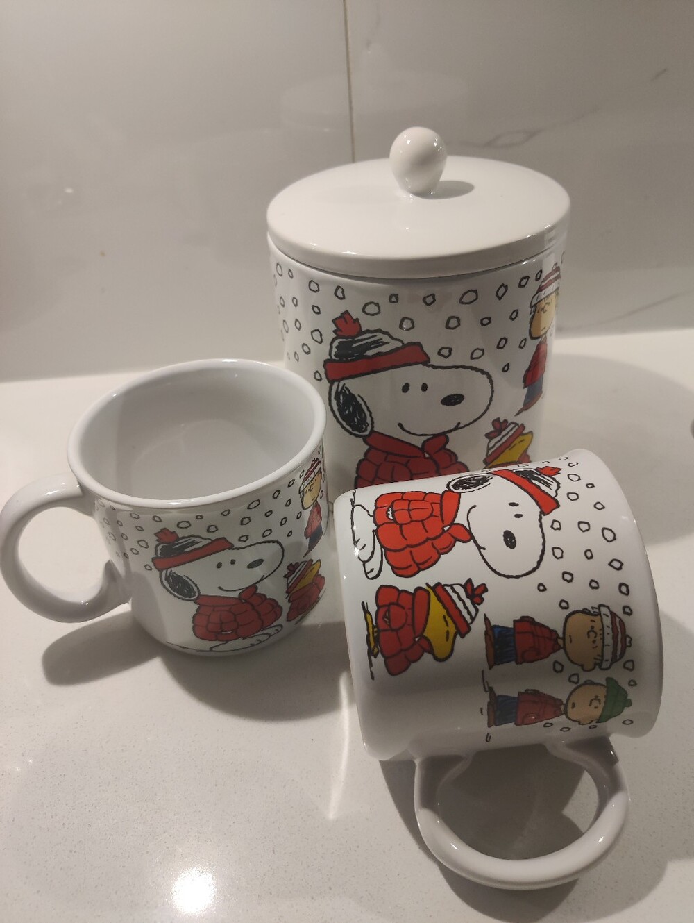 ZRIKE...A Holiday Cookie Jar and Two y and Woodstock in Red Puffer Jackets...